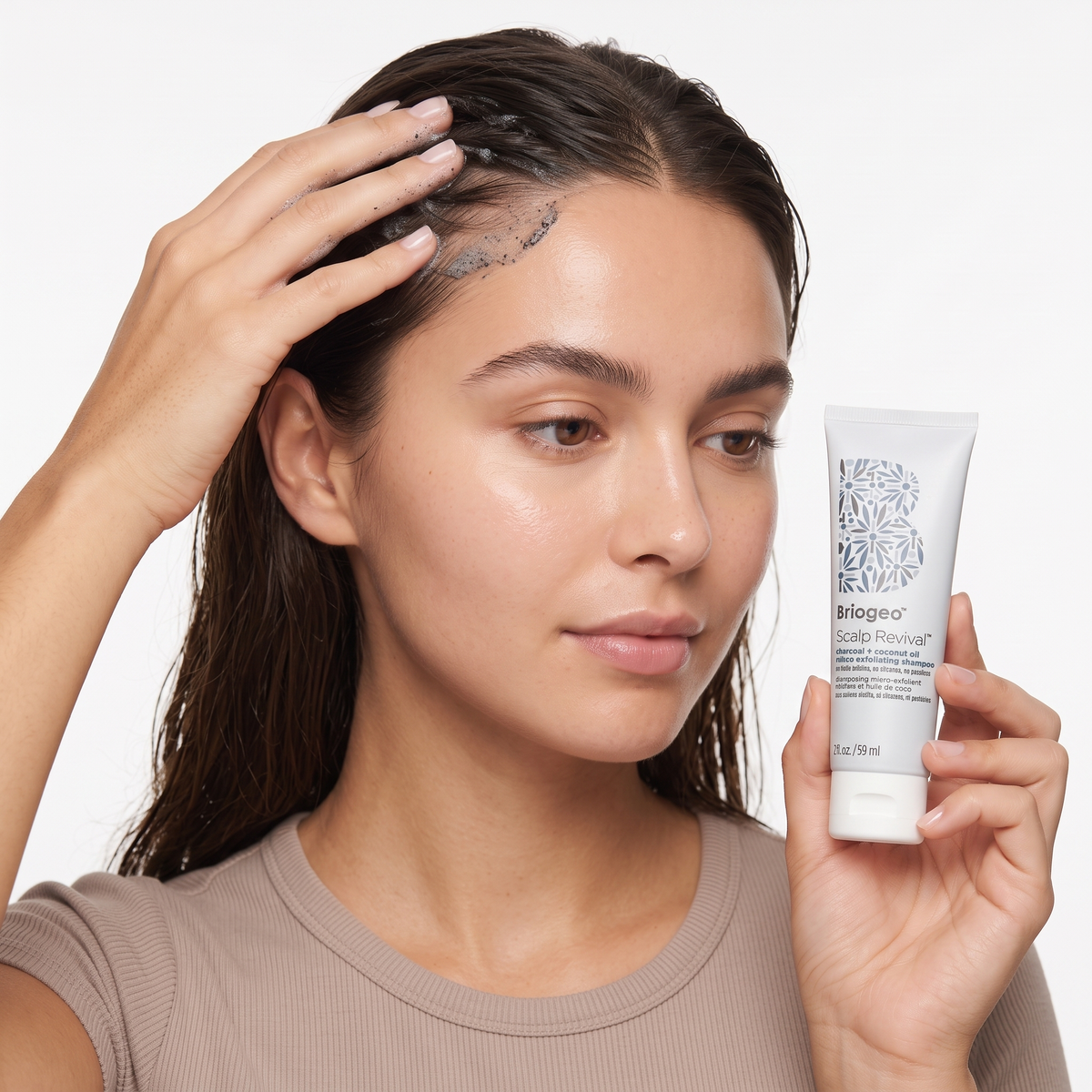 Who should try Briogeo Scalp Revival Charcoal Coconut Exfoliating Shampoo — model massaging scalp