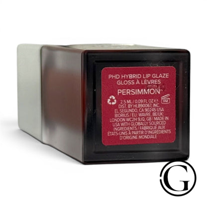 GOODSNYC Haus Labs PhD Hybrid Lip Glaze mini in Persimmon shade, showing the product label on the base