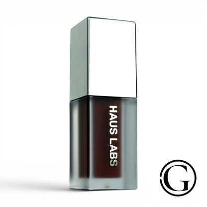 GOODSNYC Haus Labs PhD Hybrid Lip Glaze in Persimmon, a mini coral-orange plumping gloss with a glass-like finish.