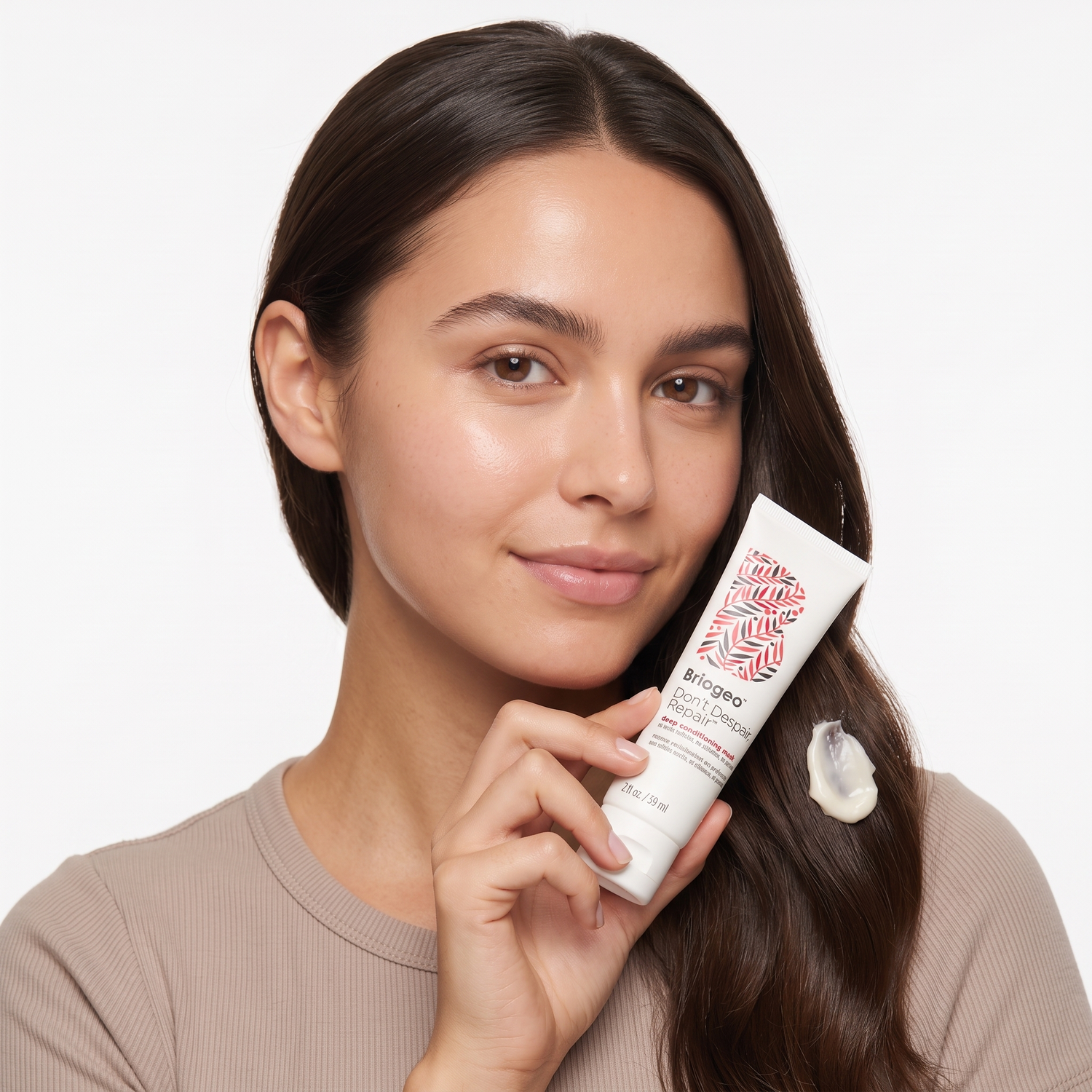 Who should try Briogeo Don't Despair Repair Deep Conditioning Mask — model with the mask product and glossy hair