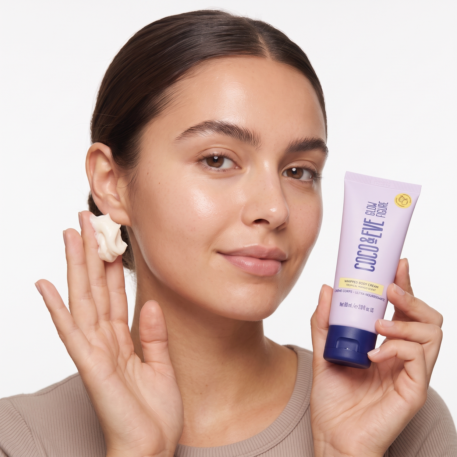 Who should try Coco & Eve Glow Figure Whipped Body Cream Tropical Mango — model with the tube and whipped cream