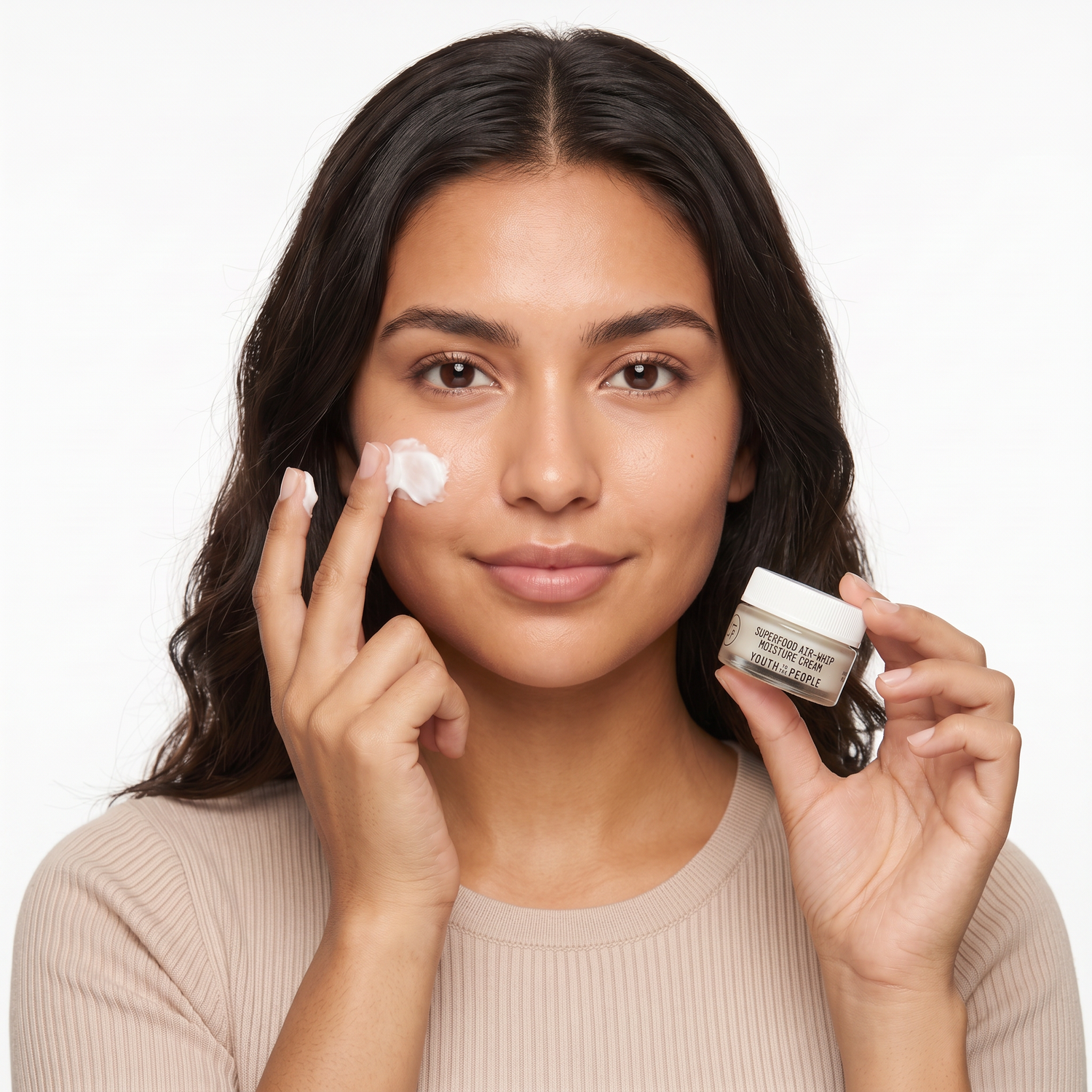 Who should try Youth To The People Superfood Air-Whip Moisturizer — model applying moisturizer