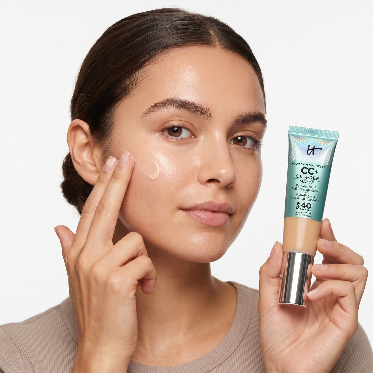 Who should try IT Cosmetics Oil-Free Matte CC+ Cream SPF 40 — model blending CC cream
