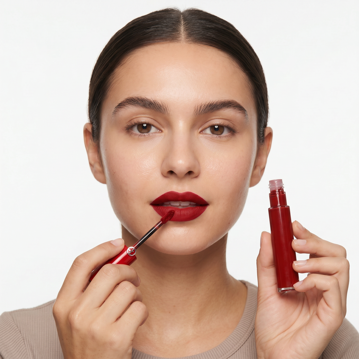 Who should try Giorgio Armani Lip Maestro Sultan 405 — model applying deep red liquid lipstick