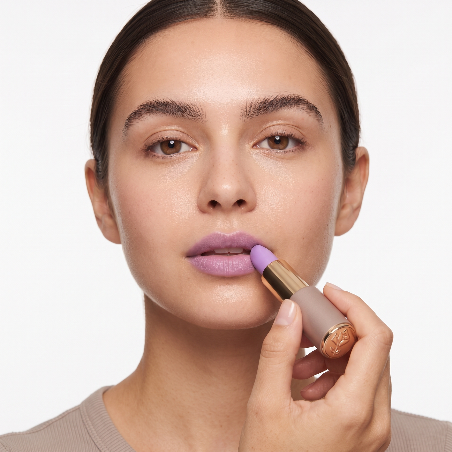 Who should try Lancome L'Absolu Rouge Intimatte 404 — model applying lilac lipstick